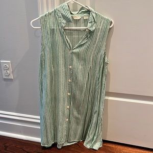 Green and white striped sleeveless blouse